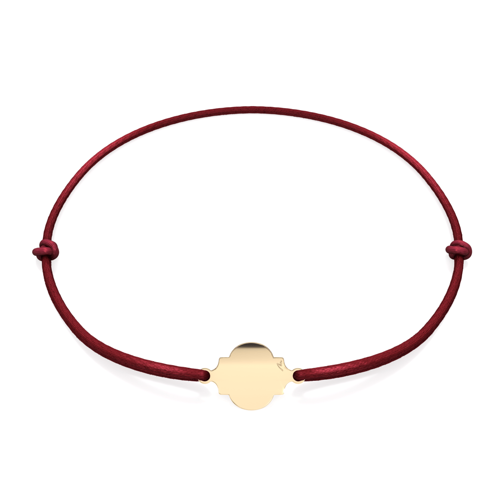 14 KT yellow gold Full Heart of Orient bracelet on string
