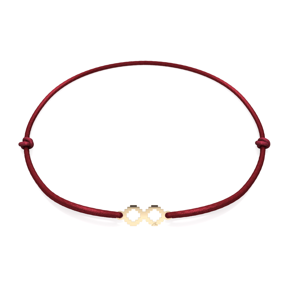 14 KT yellow gold Infinity Symbol bracelet on string