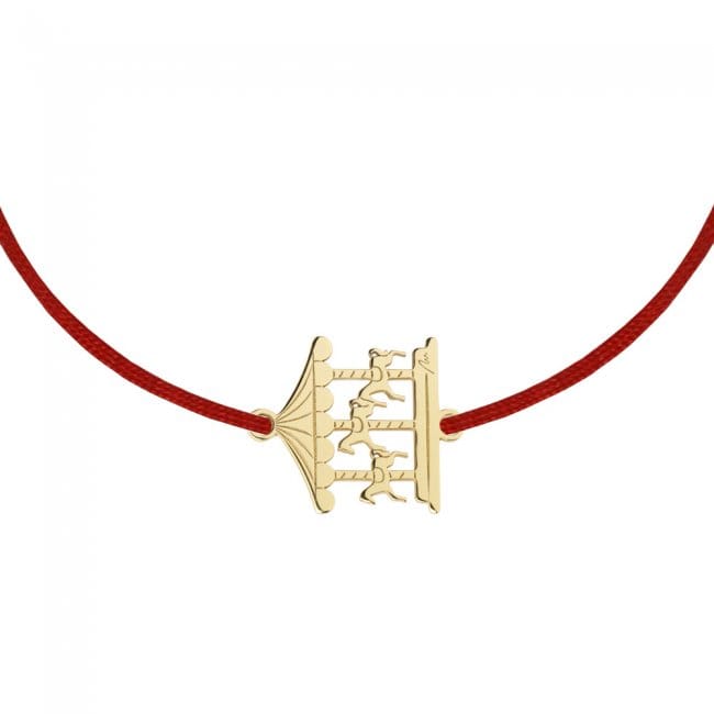 14 KT yellow gold Carousel bracelet on string