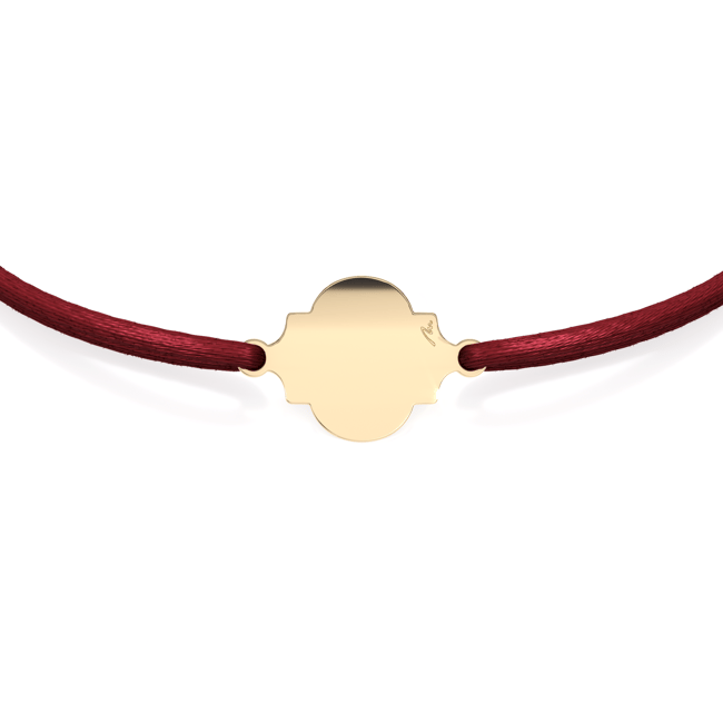 14 KT yellow gold Full Heart of Orient bracelet on string
