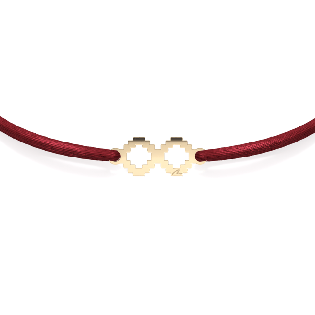 14 KT yellow gold Infinity Symbol bracelet on string