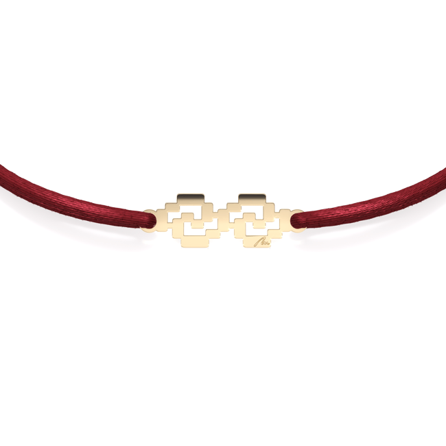 14 KT yellow gold Spiral bracelet on string